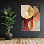 Geometric abstract artwork with gold, rose, and earthy-toned overlapping circular shapes