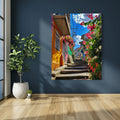 AI-generated image of a colorful hillside street lined with flowers and painted houses.